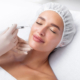 Woman receiving Sculptra dermal filler injection in cheek