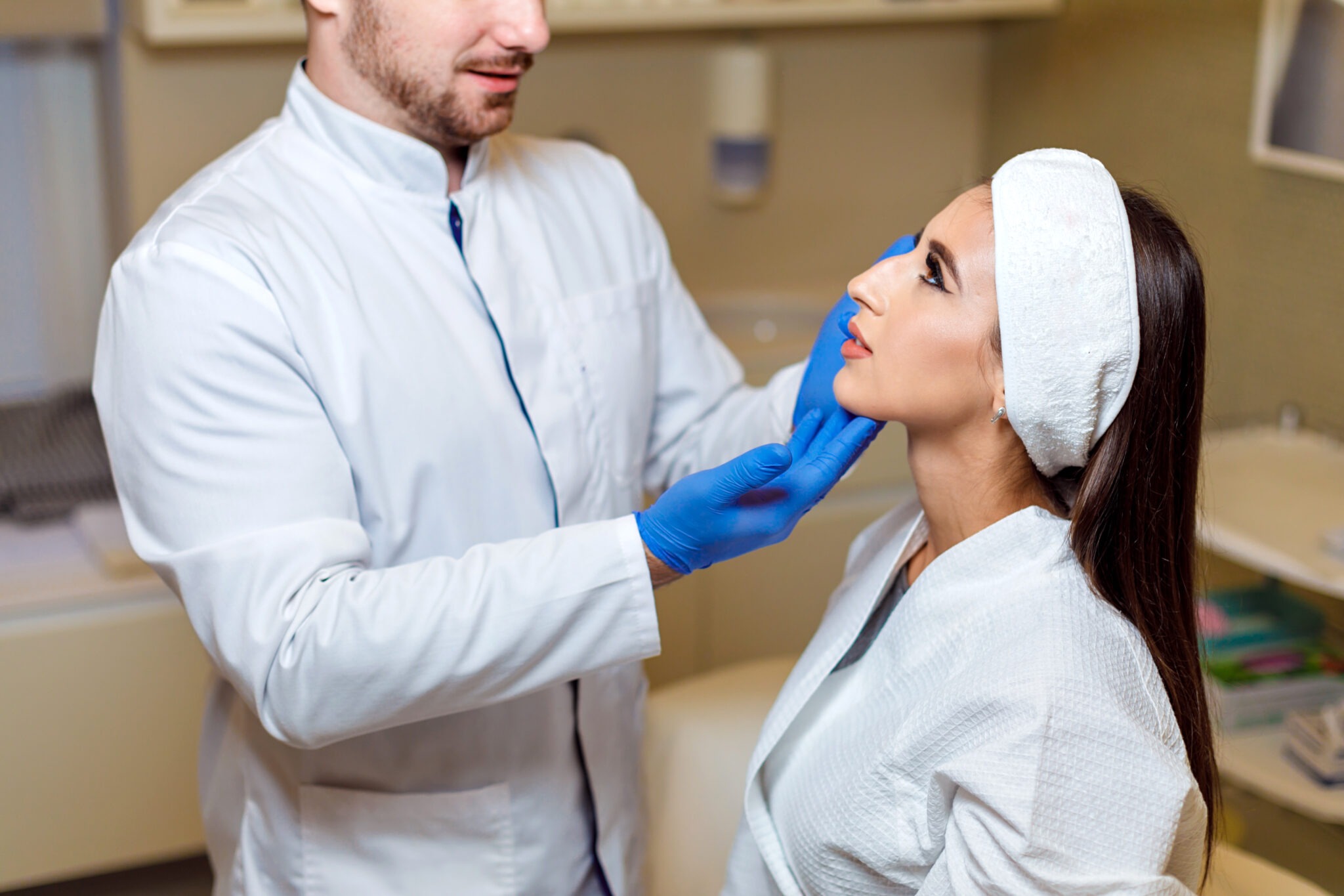 Patient and injector discussing non-surgical rhinoplasty