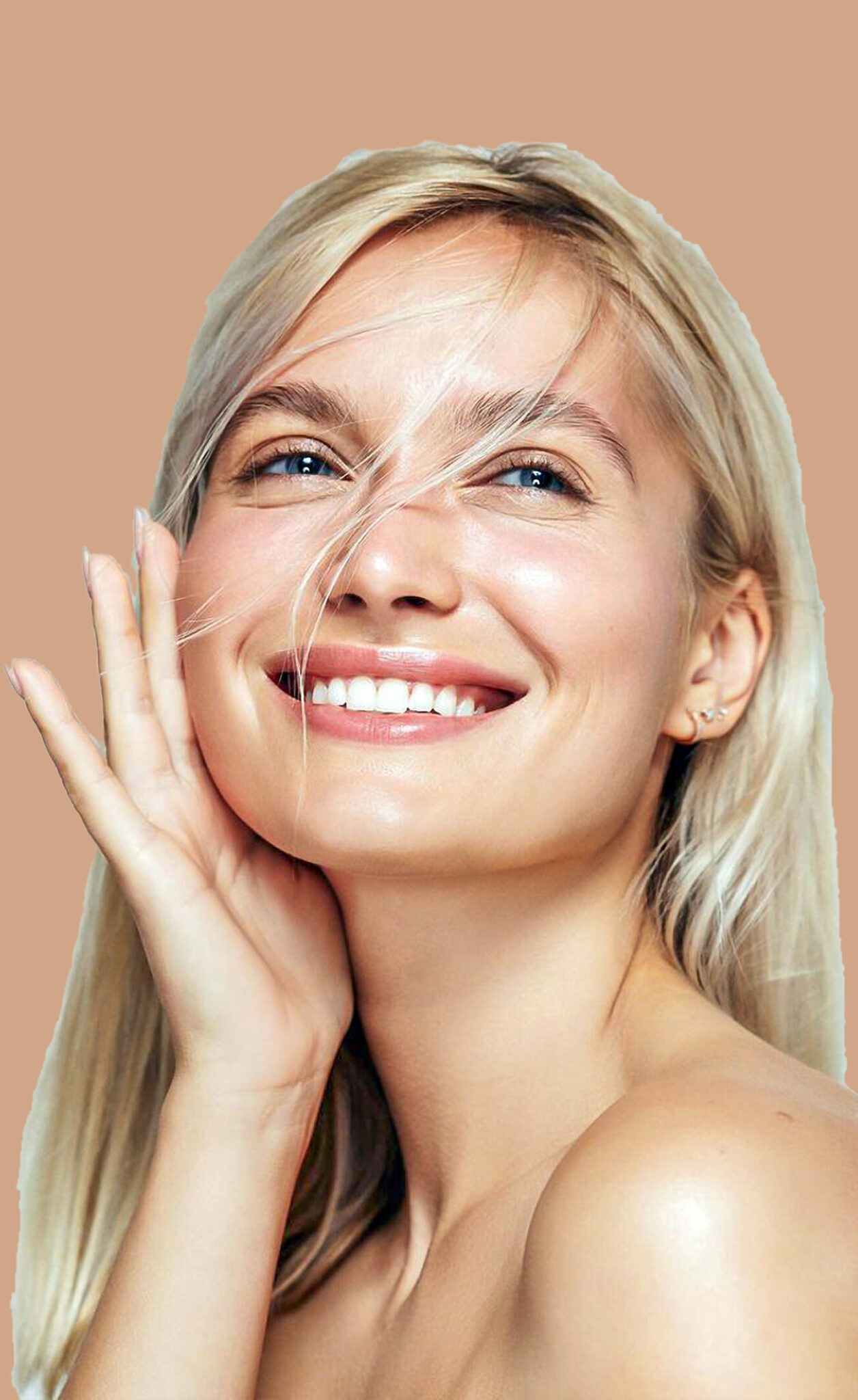 Woman smiling with refreshed, hydrated skin