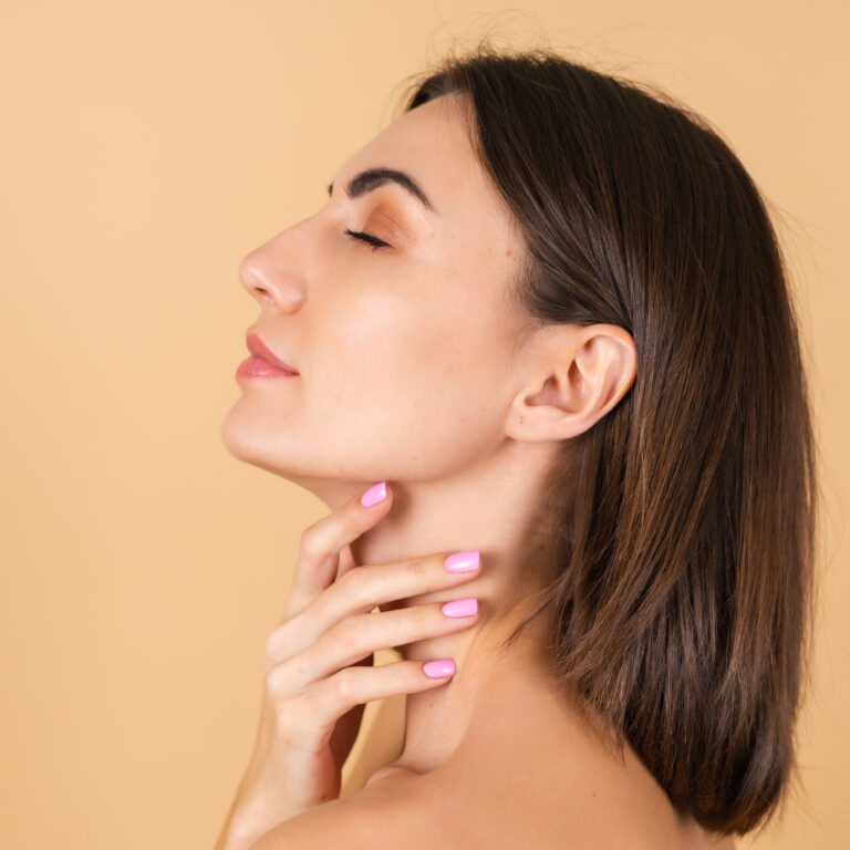 Woman with enhanced chin after non-surgical contouring