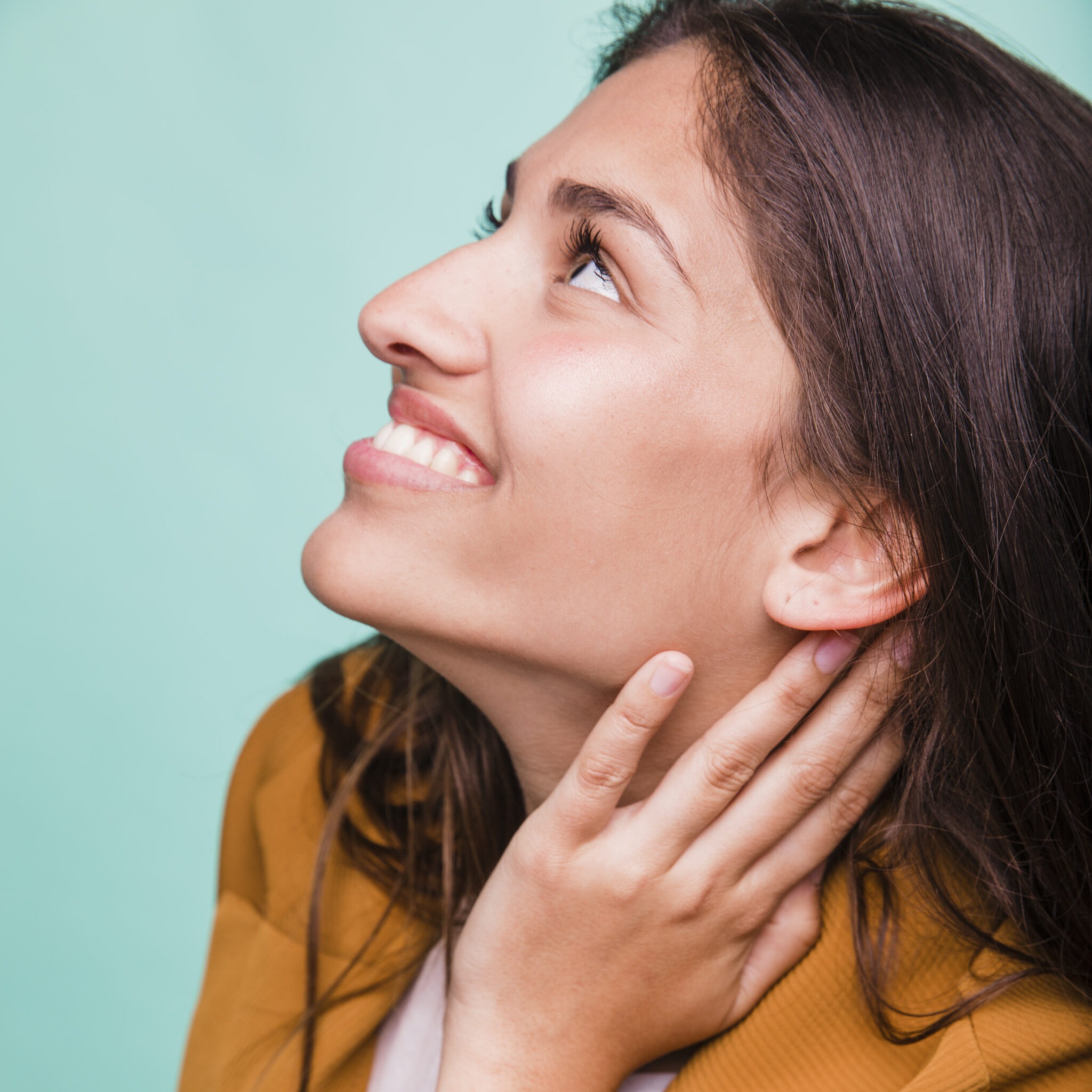 Happy client with refined nose after liquid rhinoplasty