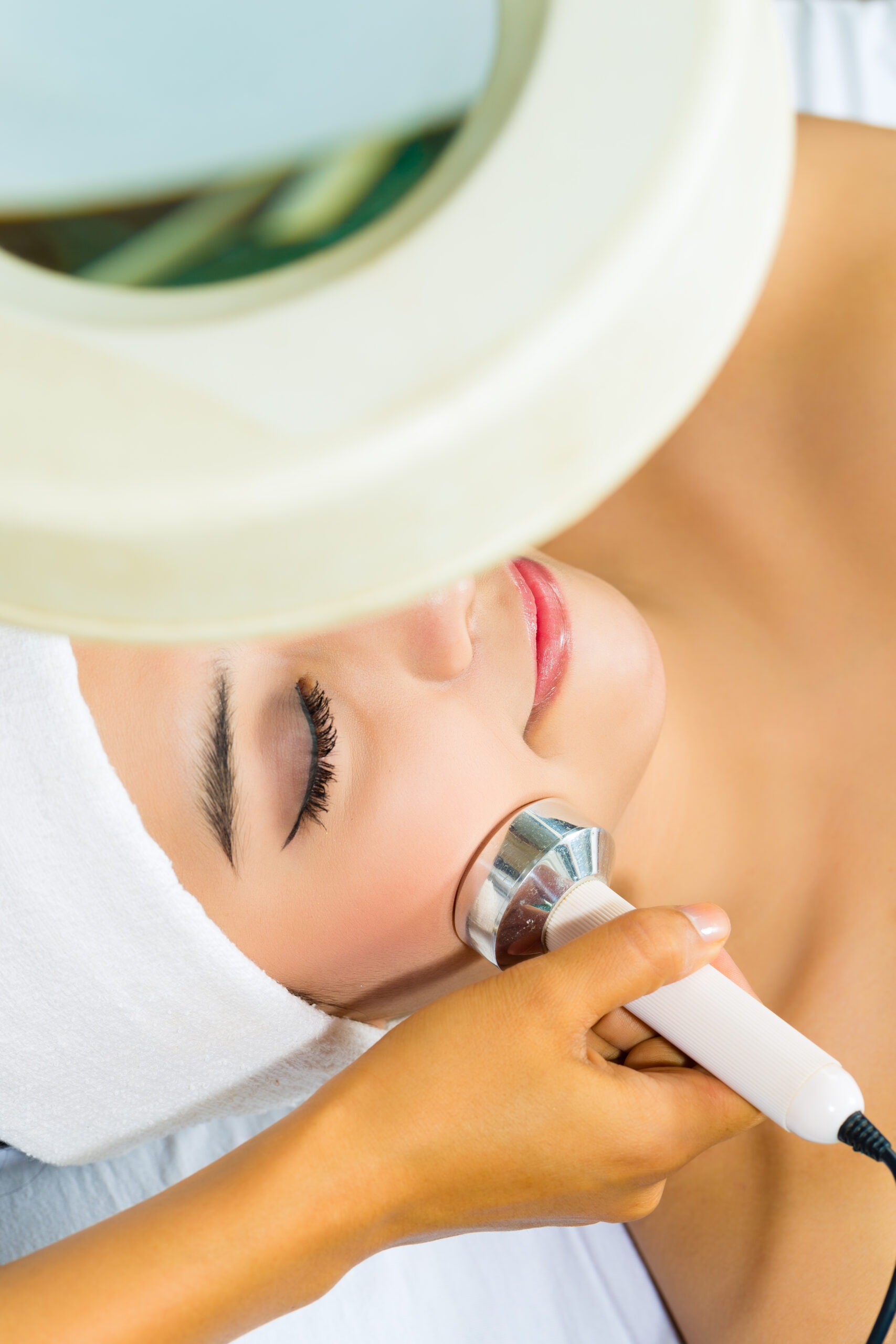 Fractional CO₂ laser skin rejuvenation treatment to boost collagen and smooth texture.