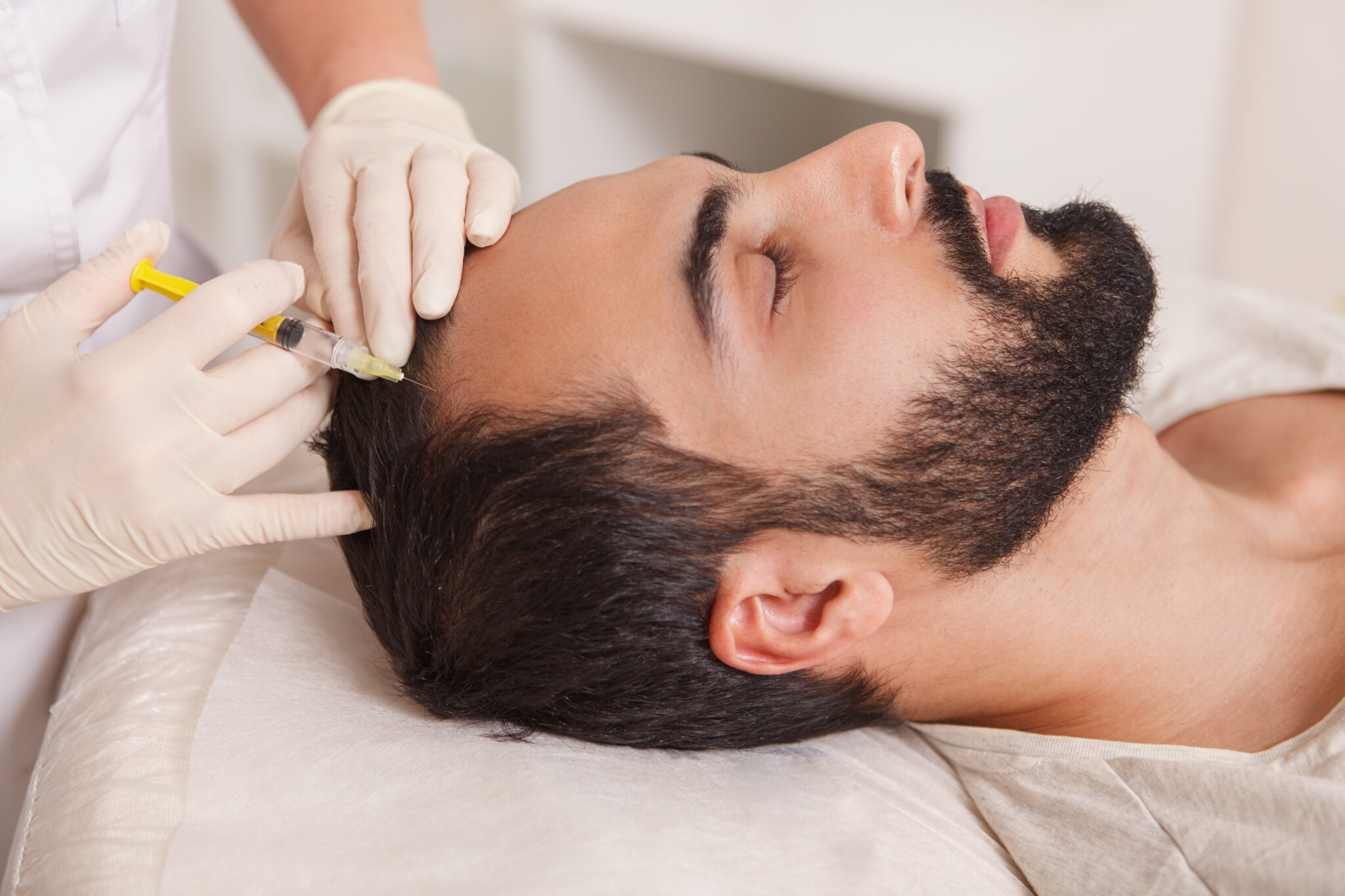 PRP and Exosome scalp therapy for hair restoration and follicle regeneration in Riyadh.