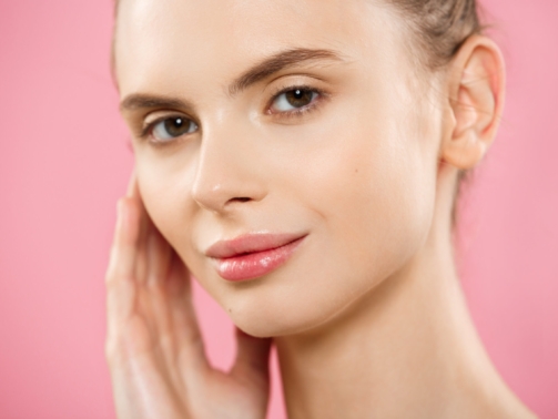 Natural lip and cheek enhancement focused on facial harmony