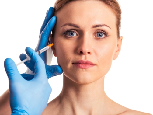 Facial rejuvenation using collagen-stimulating fillers