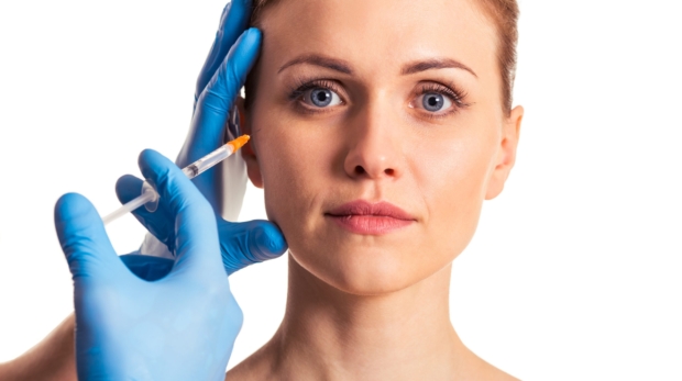 Facial rejuvenation using collagen-stimulating fillers