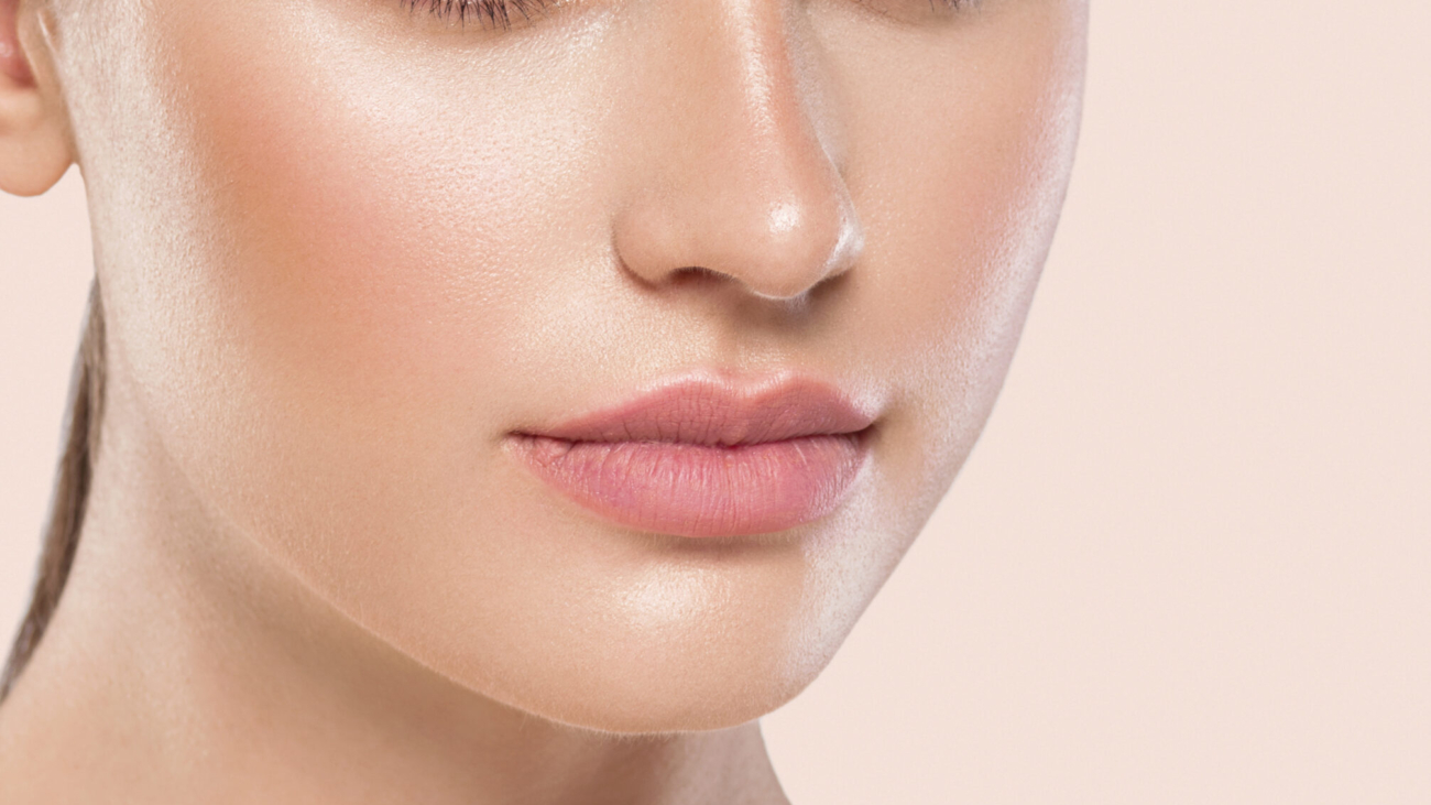 Woman with natural lip and cheek fillers Ramadan ready glow