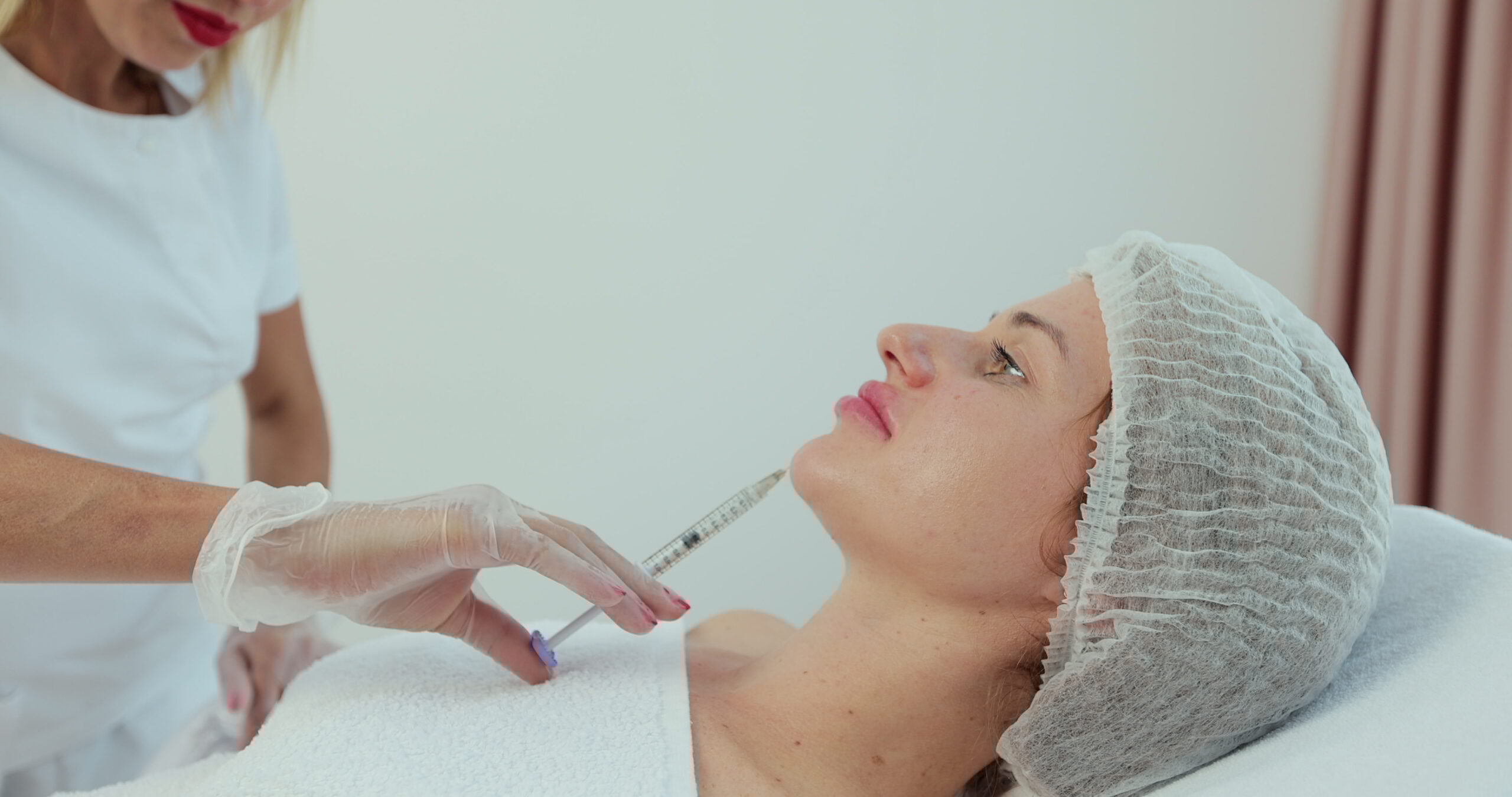 Practitioner performing liquid facelift injections in Riyadh during Ramadan